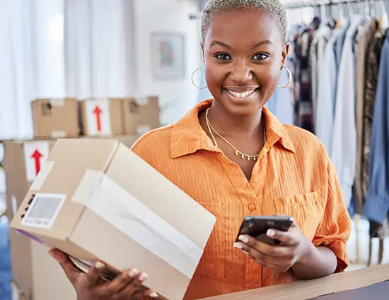 woman business owner with a mobile phone